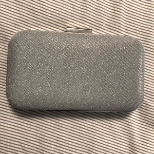 Silver clutch purse with medal chains